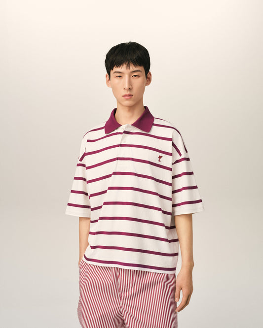 White cotton polo with Ami de Coeur arrow