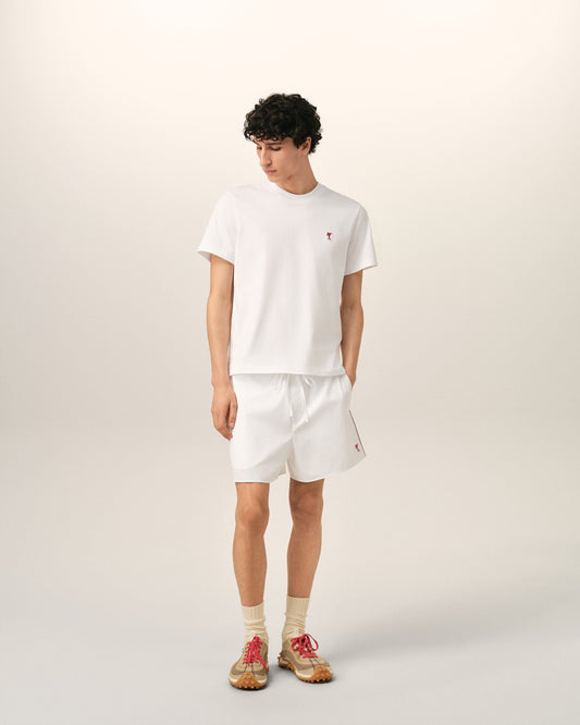 White cotton shorts with Ami de Coeur arrow